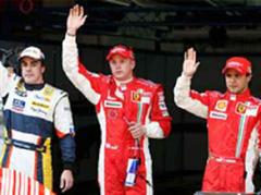 Fernando Alonso, Kimi Räikkönen und Felipe Massa posieren nach dem Qualifying.